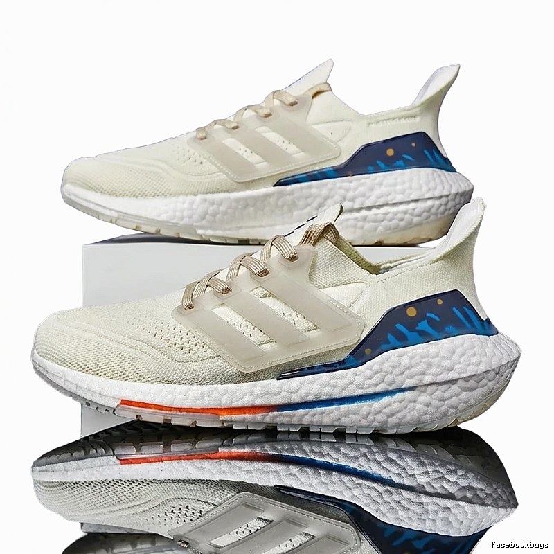 Adidas retro-style white and blue sports shoes