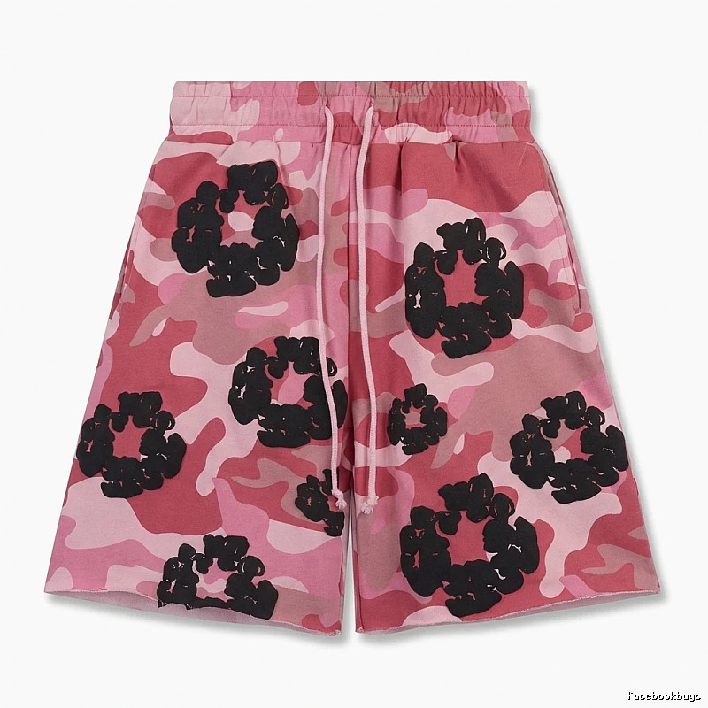 DENIM TEARS camouflage-style shorts