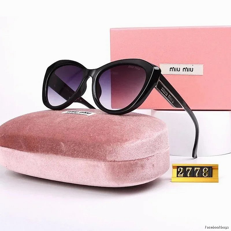 Miu Miu Travel Oversized sunglasses Black Oval Sunglasses with Modern Look